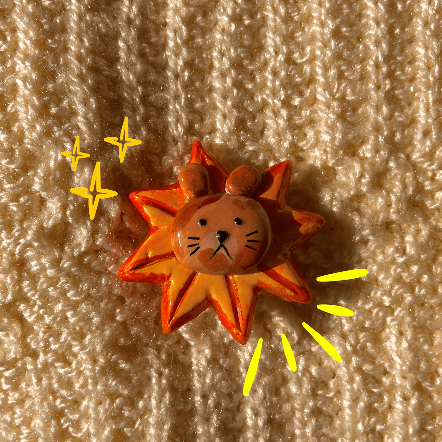 Sun-shaped object with a face on a textured beige background