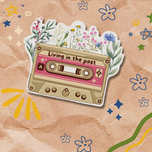 Illustration of a cassette tape with 'Living in the past' text on a floral background
