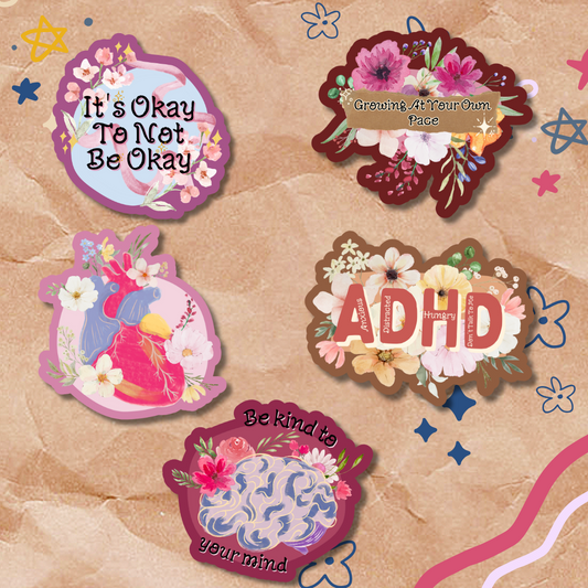 Set of five decorative stickers with motivational phrases on a textured beige background.